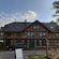 A Bavarian style farmhouse with brick and decorative timber framing
